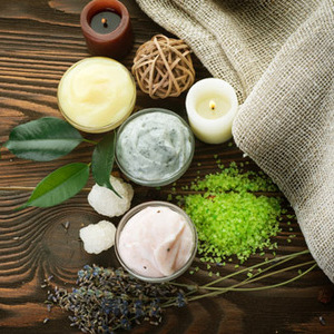 image of creams and candles for wellbeing
